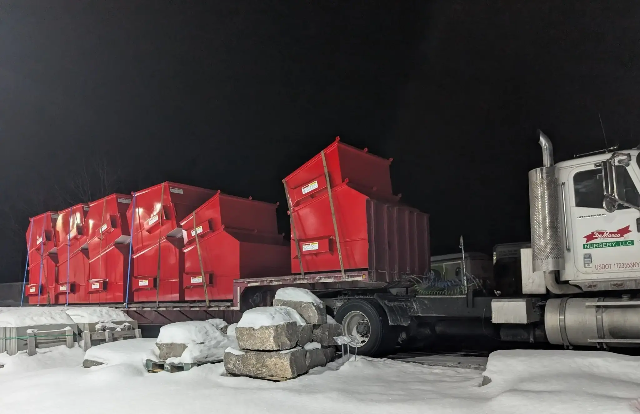 Commercial dumpster rentals in Saginaw prepared for delivery to multiple business locations.