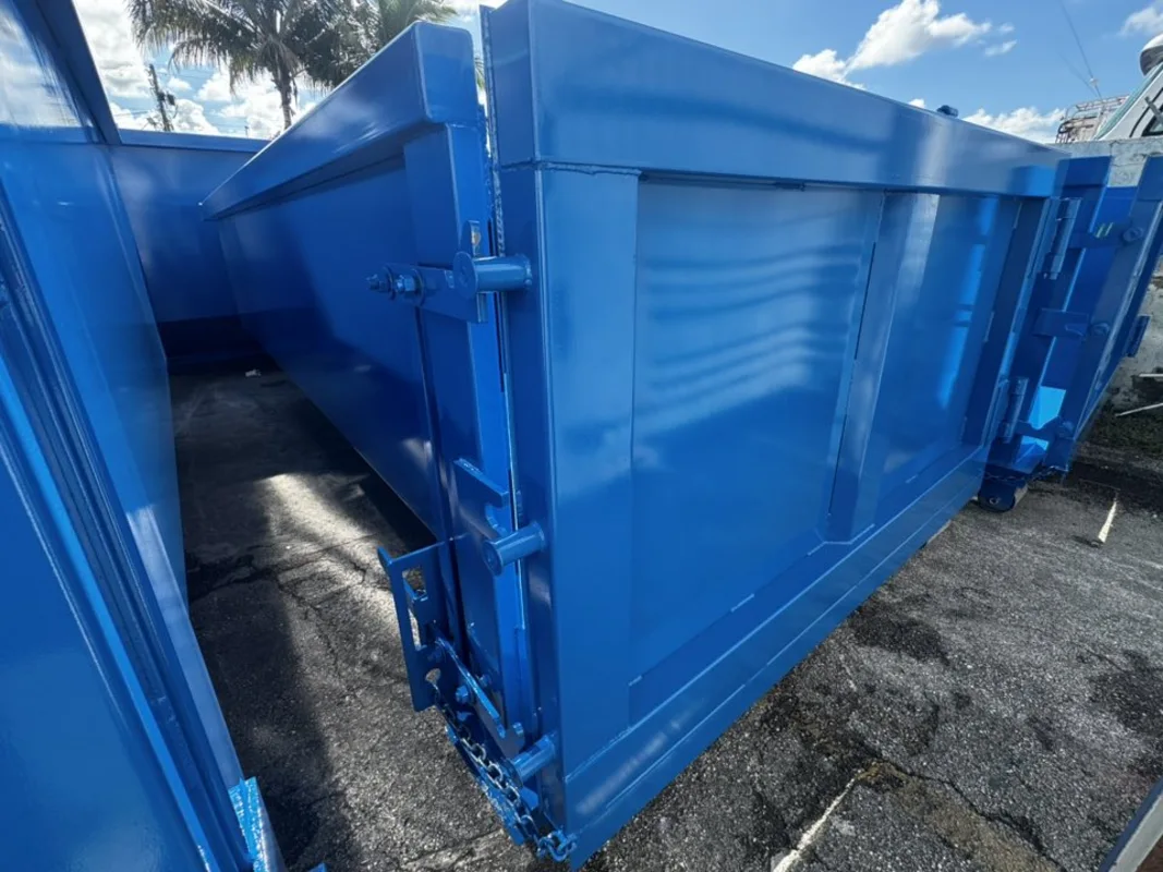 Gallery 5 Blue roll-off dumpster container used for construction and cleanup projects in Saginaw Michigan